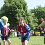 girl catching a ball