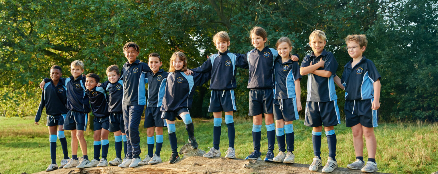 group of children on top of a log