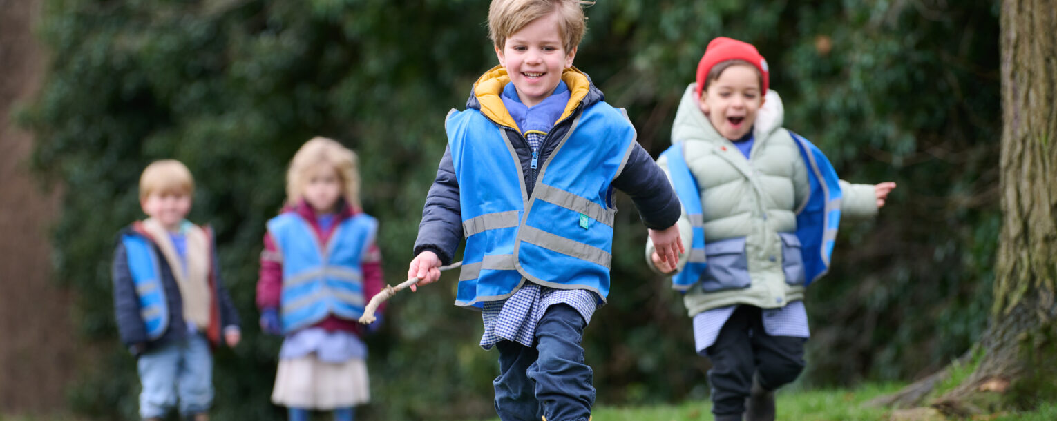 kids running in the forest