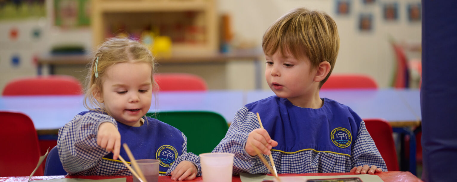 2 children in the nursery classroom